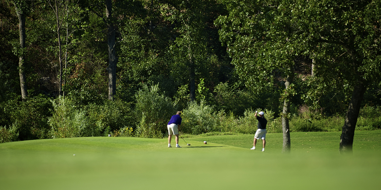 two golfers enjoying the championship course at Eagle Creek Golf Club